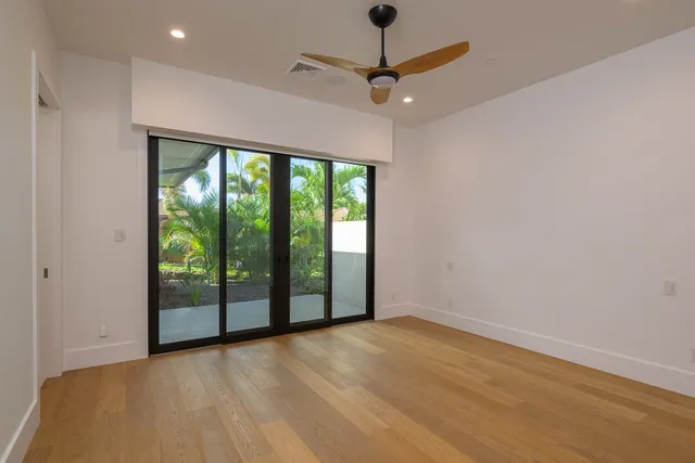 a bathroom with 2 sink and a mirror