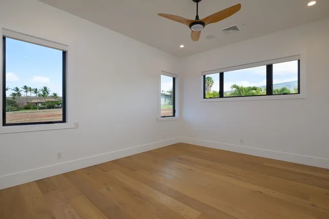 a bathroom with a double vanity sink mirror and shower