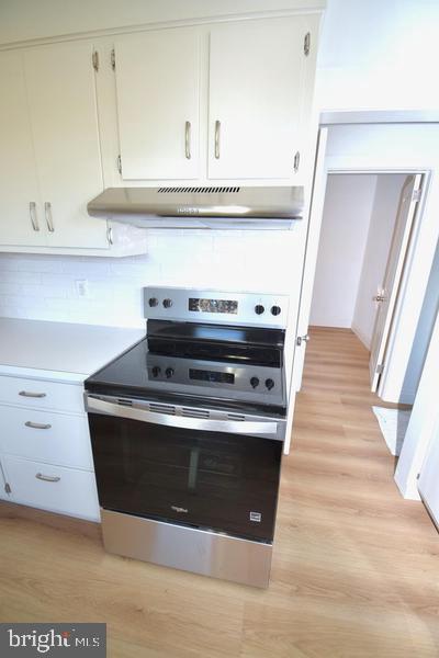 286 State Road West Grove, PA 19390 - Photo 16 of 53 a stove top oven sitting inside of a kitchen