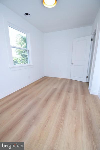 286 State Road West Grove, PA 19390 - Photo 23 of 53 an empty room with wooden floor and windows