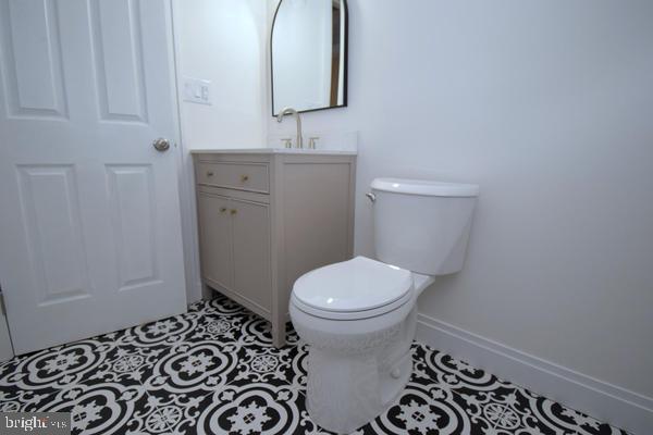 286 State Road West Grove, PA 19390 - Photo 37 of 53 a bathroom with a toilet and a mirror