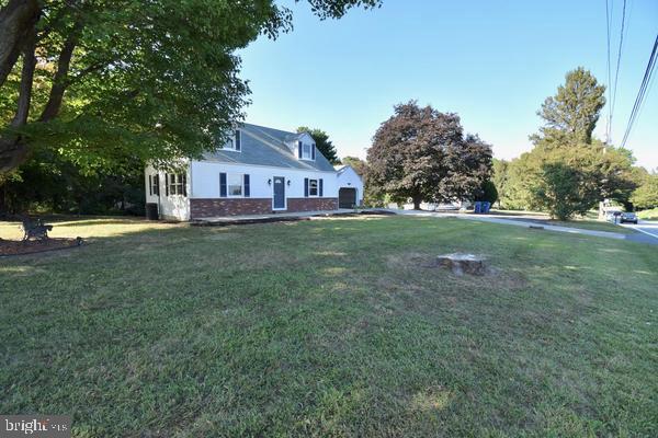 286 State Road West Grove, PA 19390 - Photo 4 of 53 a house view with a garden space