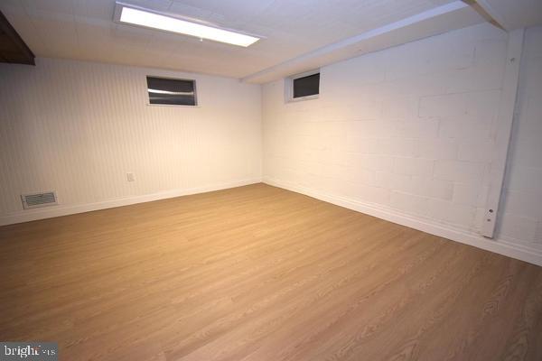 286 State Road West Grove, PA 19390 - Photo 49 of 53 an empty room with wooden floor and windows