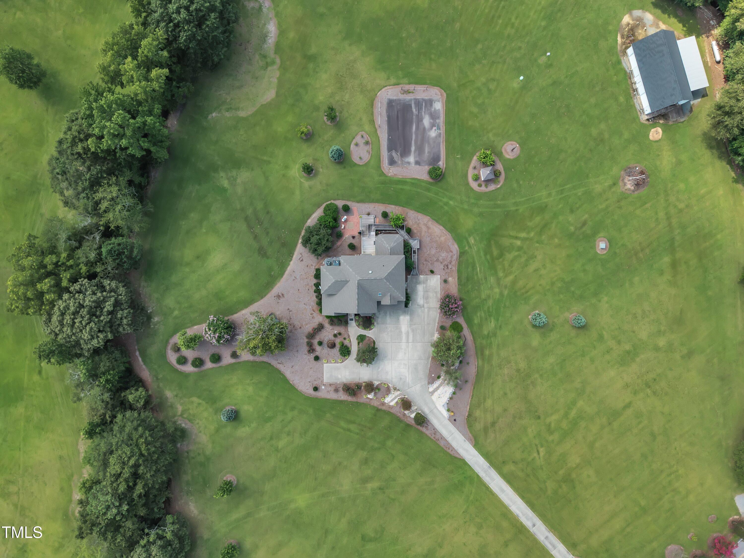 430 Federal Road Benson, NC 27504 - Photo 67 of 71 an aerial view of a house with a yard