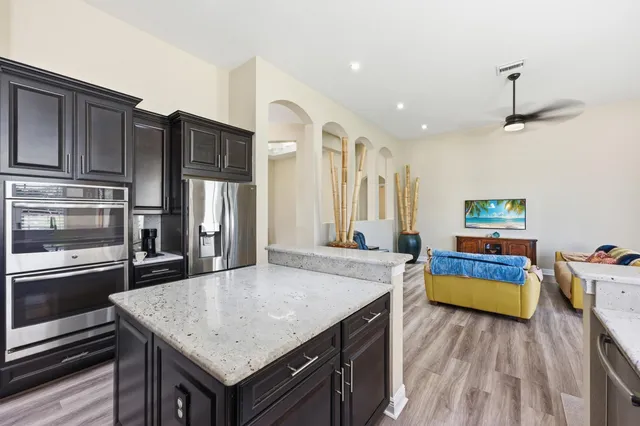 a dining room with furniture and window