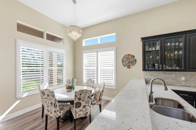 a spacious bedroom with a bed and a couch