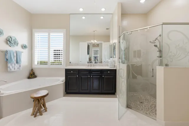 an empty room with a window and wooden floor