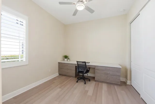 a workspace with furniture and a window