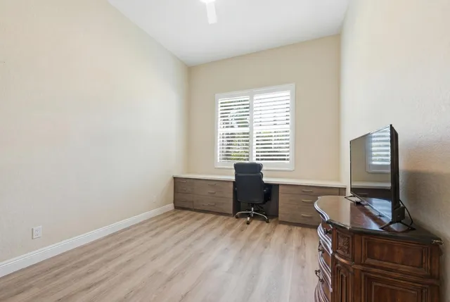 a room with furniture and a window