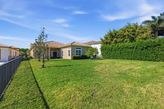 an aerial view of a house with a garden and plants