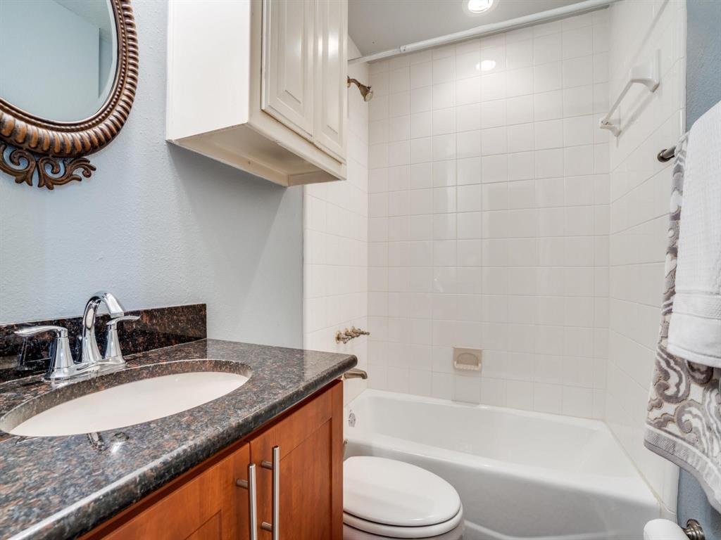 5707 Lewis Street Dallas, TX 75206 - Photo 9 of 11 Bathroom with shower / bath combination and vanity