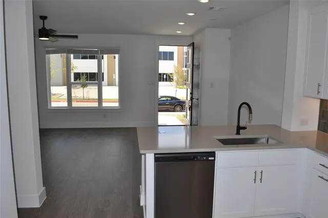a bathroom with a sink and a window