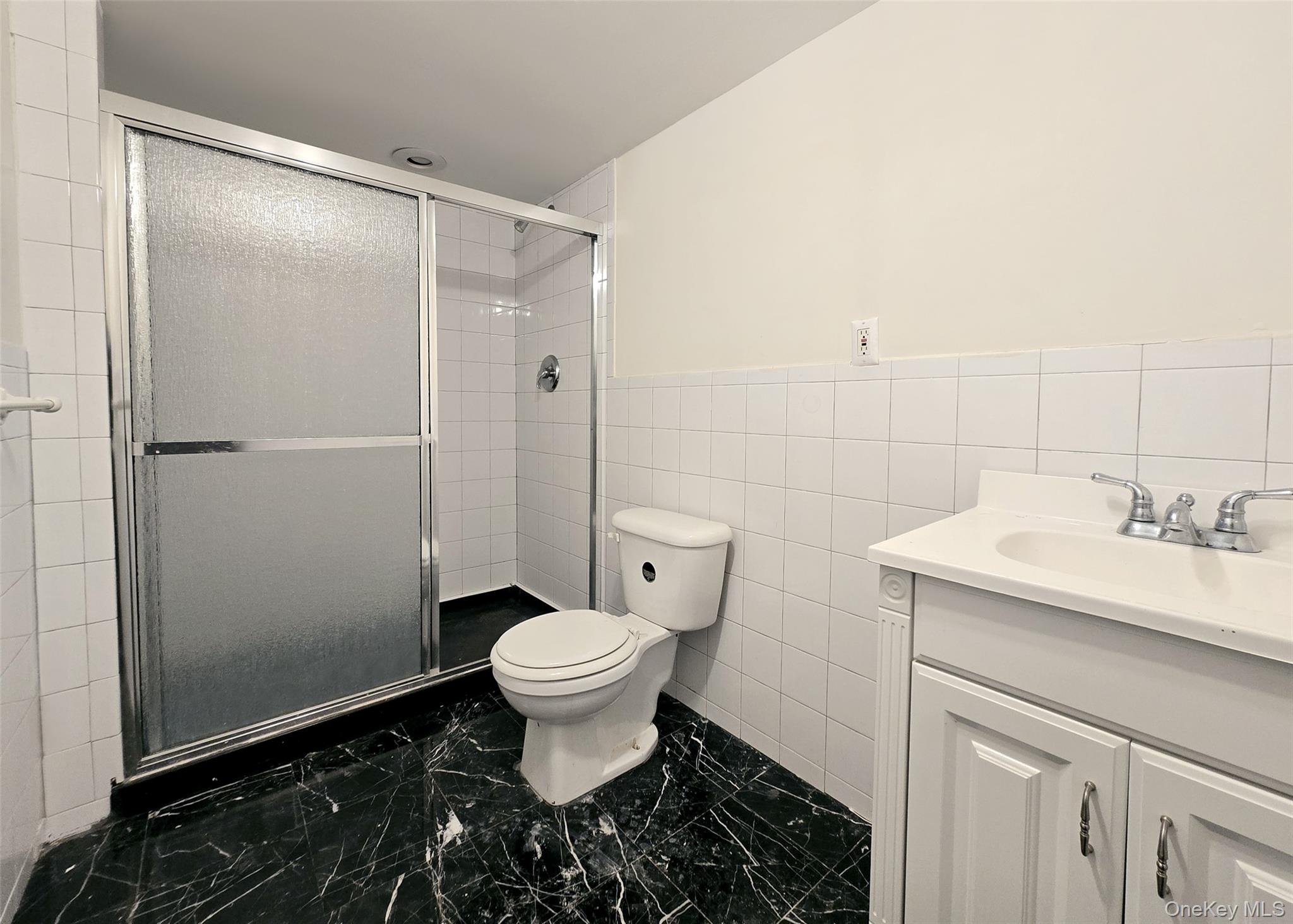 4 Cameo Road Commack, NY 11725 - Photo 14 of 23 a bathroom with a sink toilet and shower