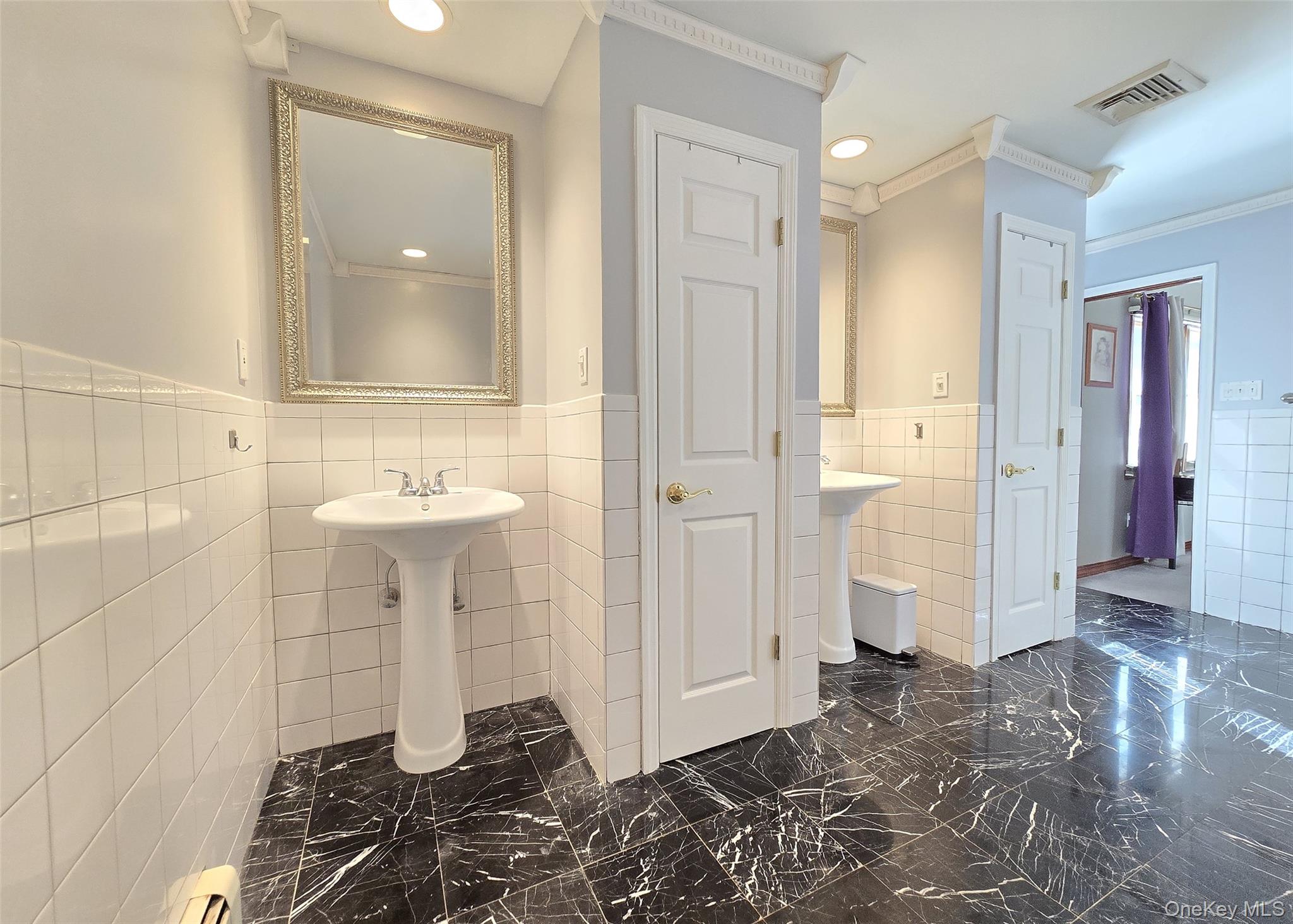 4 Cameo Road Commack, NY 11725 - Photo 16 of 23 a bathroom with a sink and a mirror