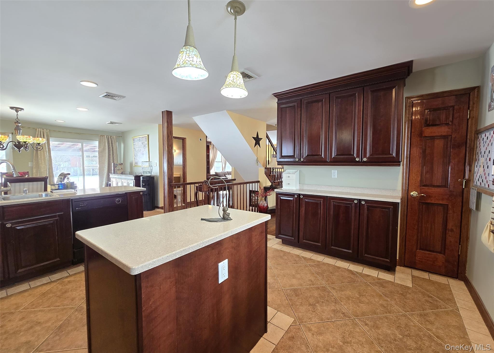 4 Cameo Road Commack, NY 11725 - Photo 2 of 23 a kitchen with stainless steel appliances granite countertop wooden cabinets a island and a sink