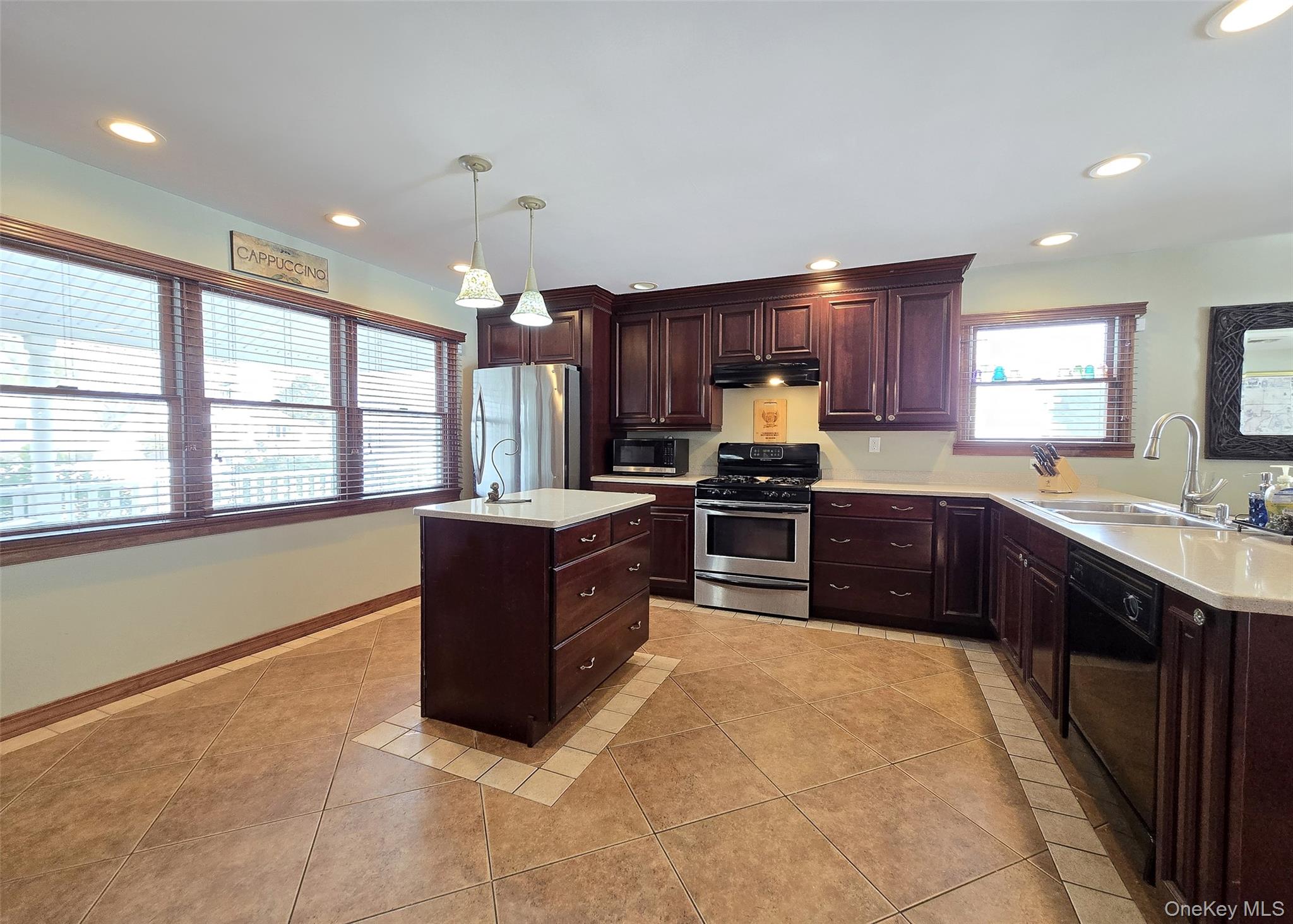 4 Cameo Road Commack, NY 11725 - Photo 3 of 23 a kitchen with granite countertop a stove cabinets and a sink