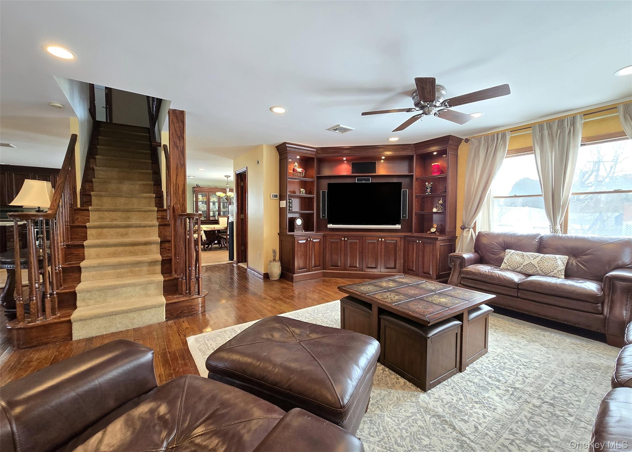 4 Cameo Road Commack, NY 11725 - Photo 7 of 23 a living room with furniture and a flat screen tv