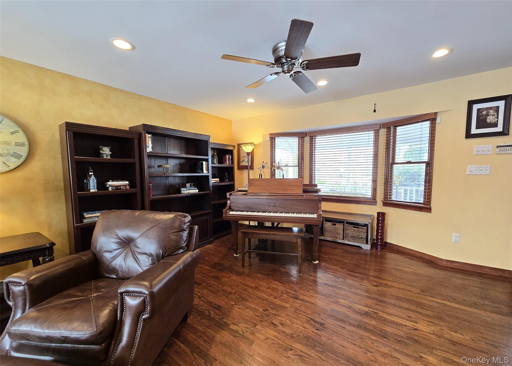 4 Cameo Road Commack, NY 11725 - Photo 10 of 23 a living room with furniture and a wooden floor