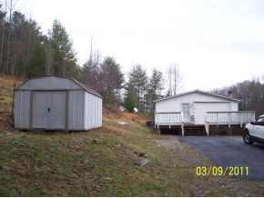 432 Browns Branch Road Hampton, TN 37658 - Photo 3 of 12 driveway side