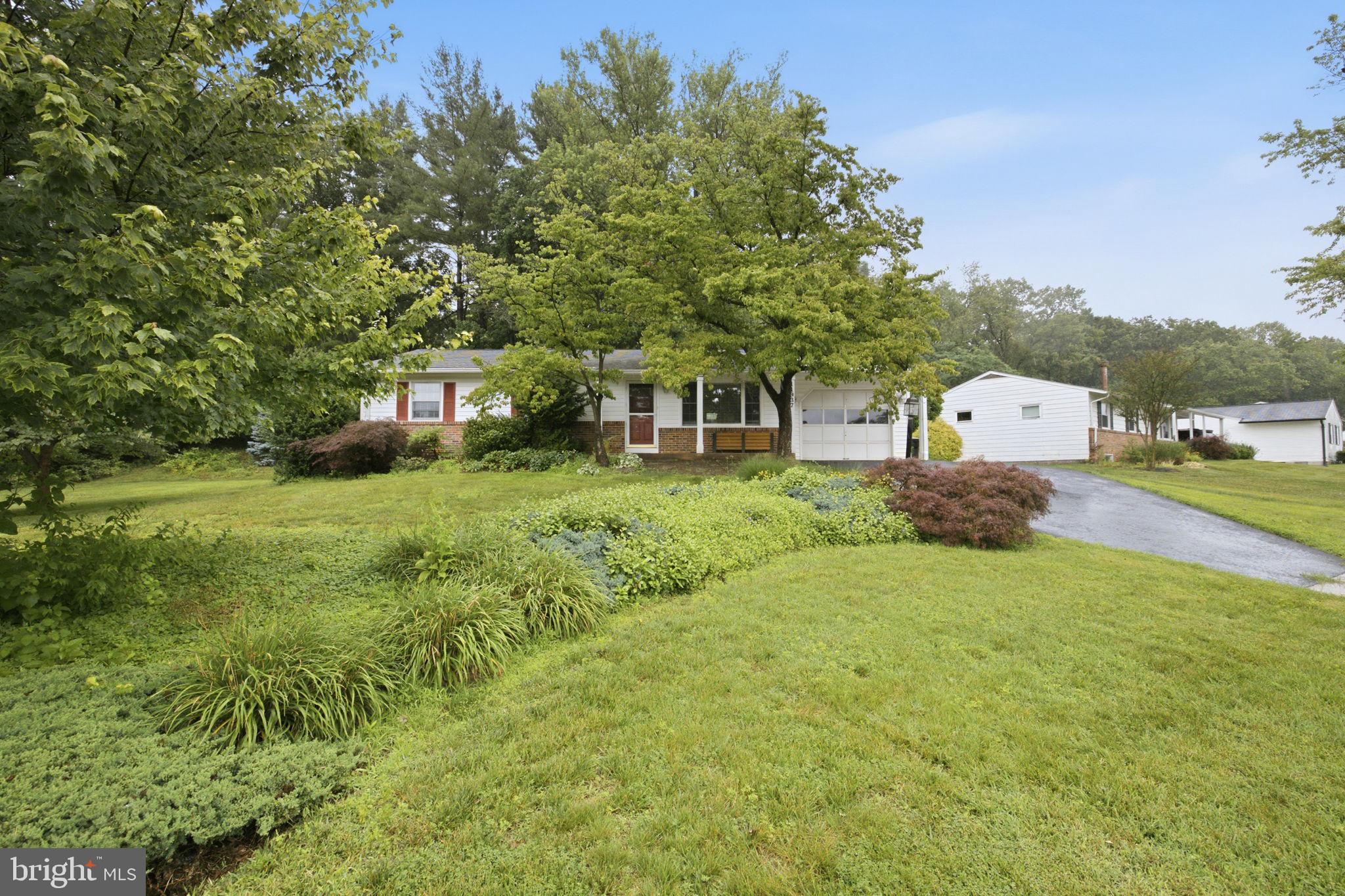 11937 Bayswater Road Gaithersburg, MD 20878 - Photo 2 of 55 Charming home nestled in lush greenery.