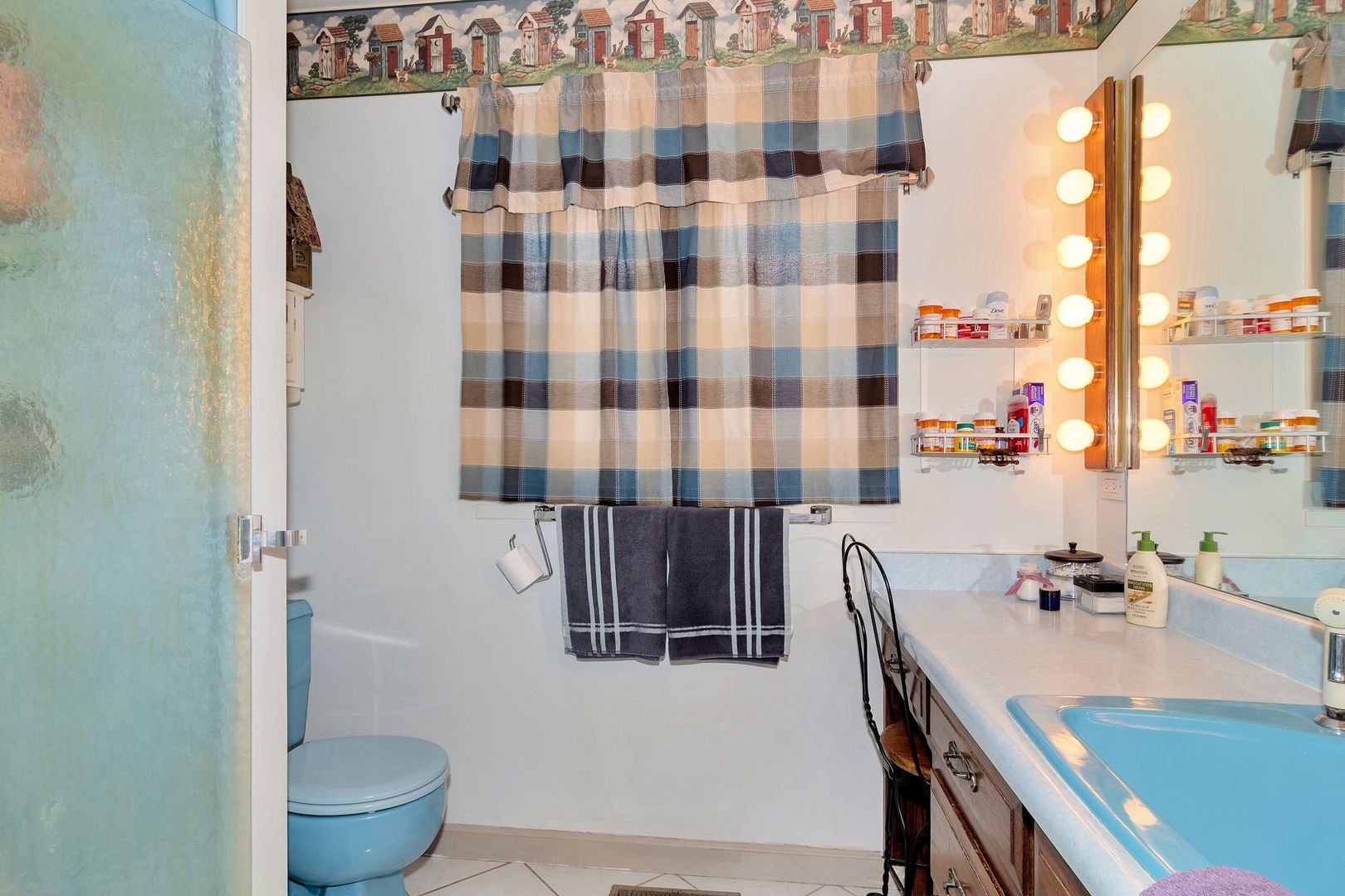 3805 West Sandwich Road Sandwich, IL 60548 - Photo 14 of 28 a bathroom with a sink toilet and shower