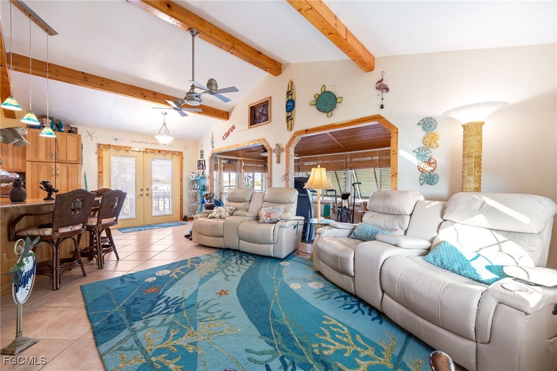 3374 York Road St. James City, FL 33956 - Photo 17 of 49 a living room with furniture and wooden floor