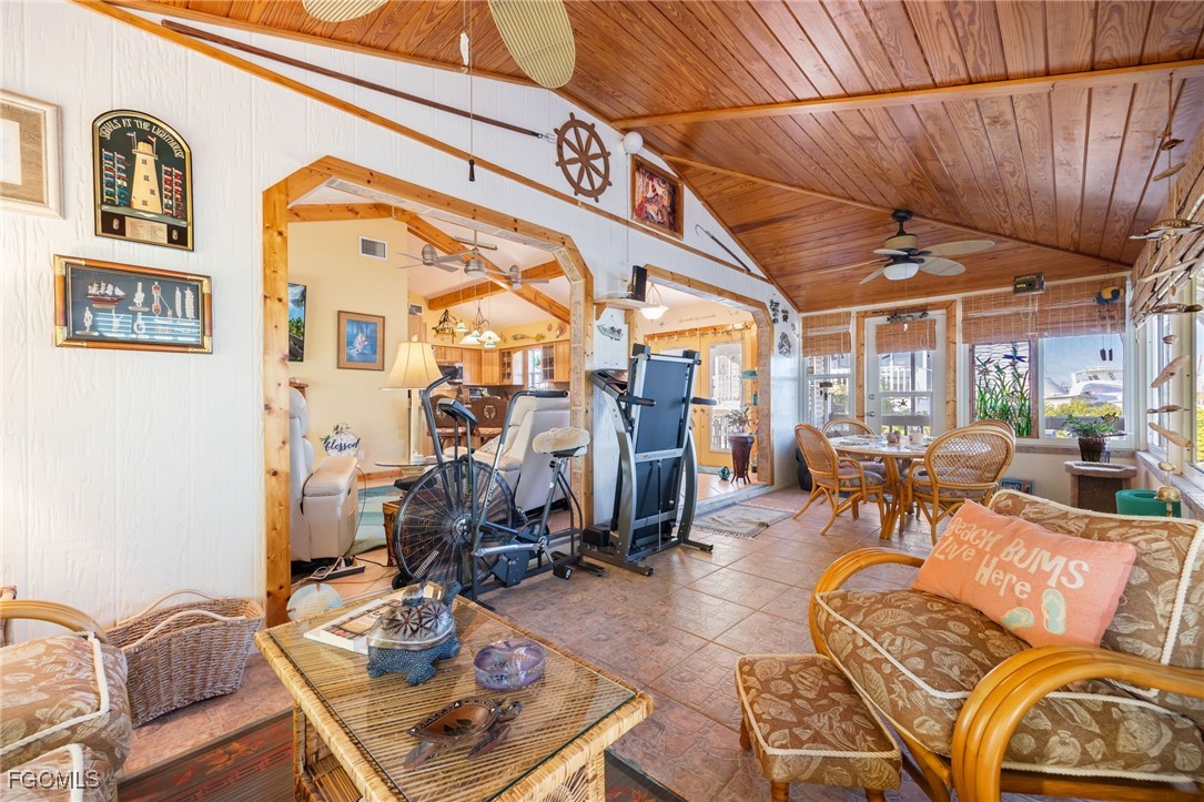 3374 York Road St. James City, FL 33956 - Photo 20 of 49 a view of a livingroom with furniture and a window