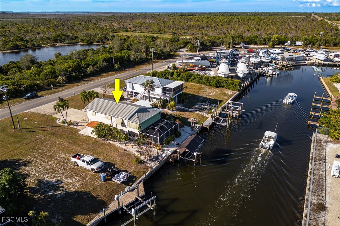 3374 York Road St. James City, FL 33956 - Photo 44 of 49 an aerial view of residential houses with outdoor space
