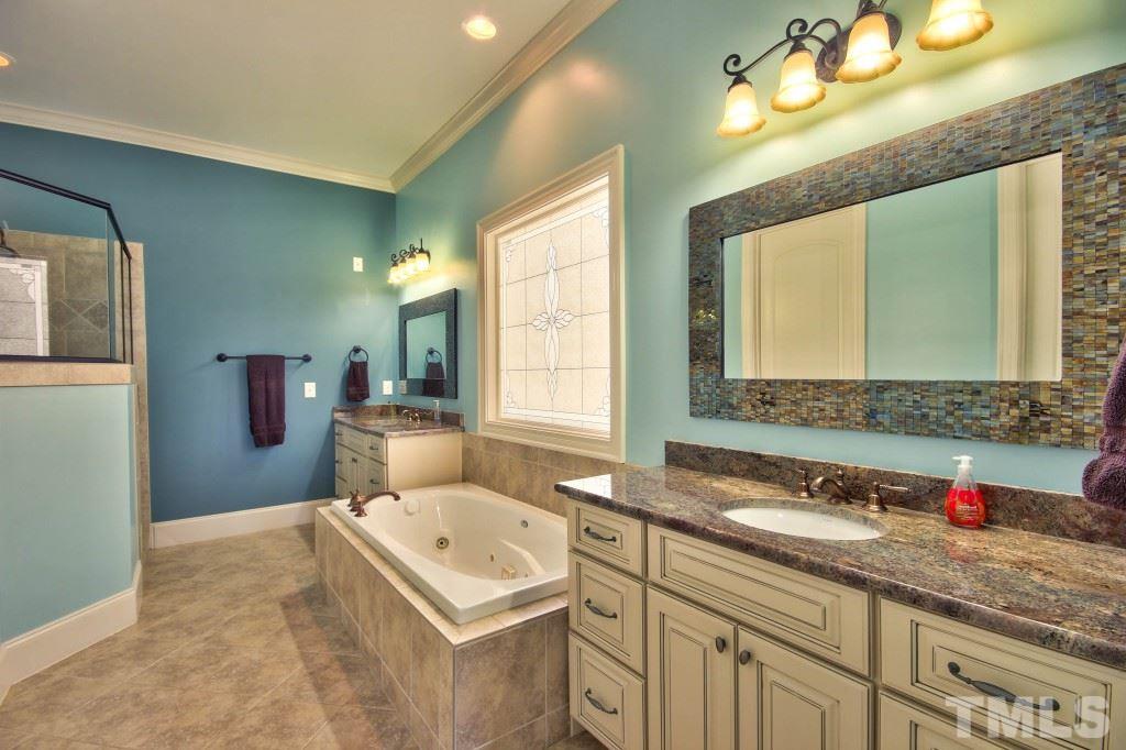 3417 Ebenezer Church Road Raleigh, NC 27612 - Photo 14 of 25 Upscale luxury master en suite! Double vanities, separate tiled shower with 2 shower heads, a separate water closet, HUGE w/i closet for your convenience!