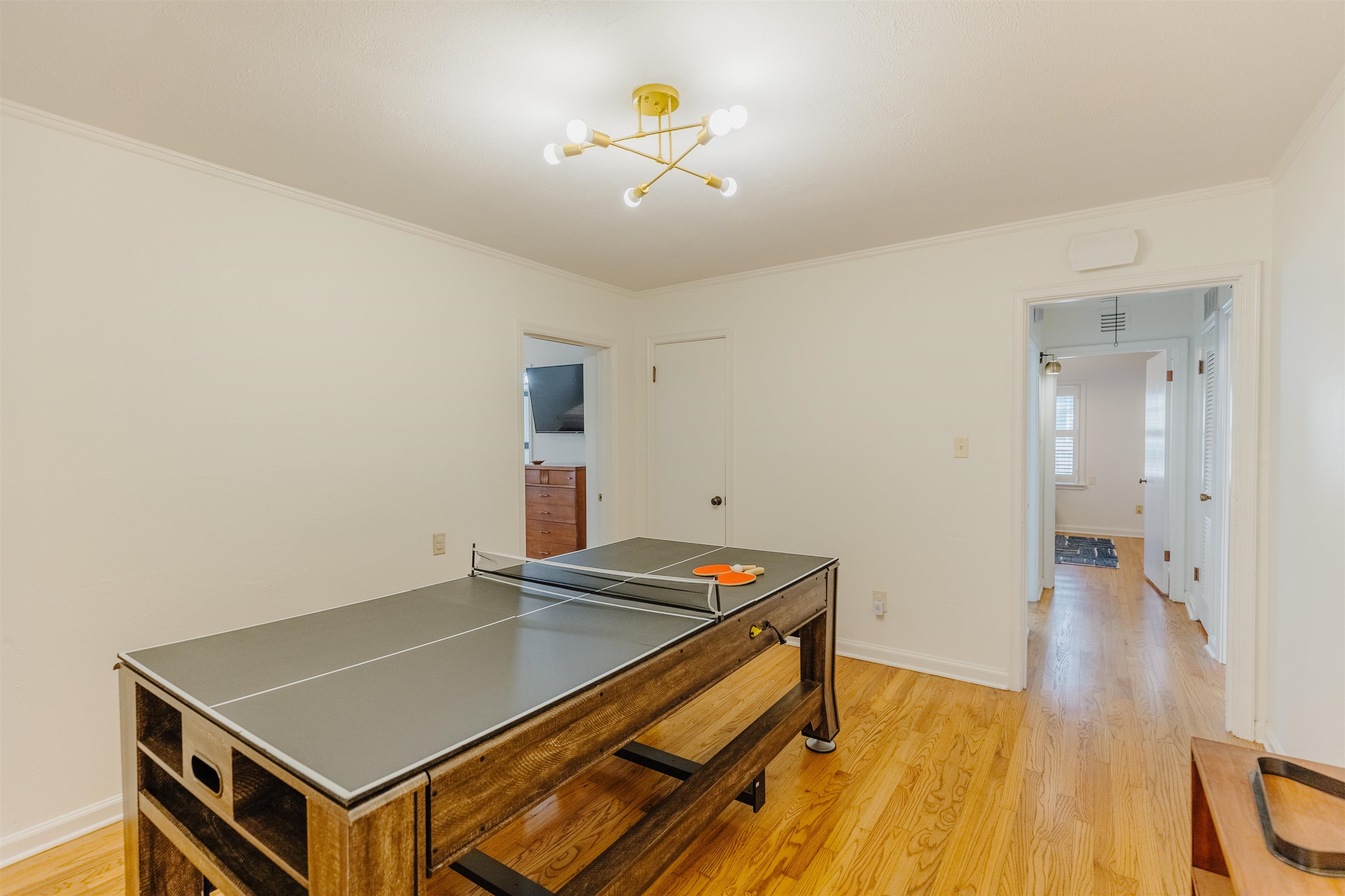 1247 Colonial Road Memphis, TN 38117 - Photo 13 of 29 a room with pool table and wooden floor