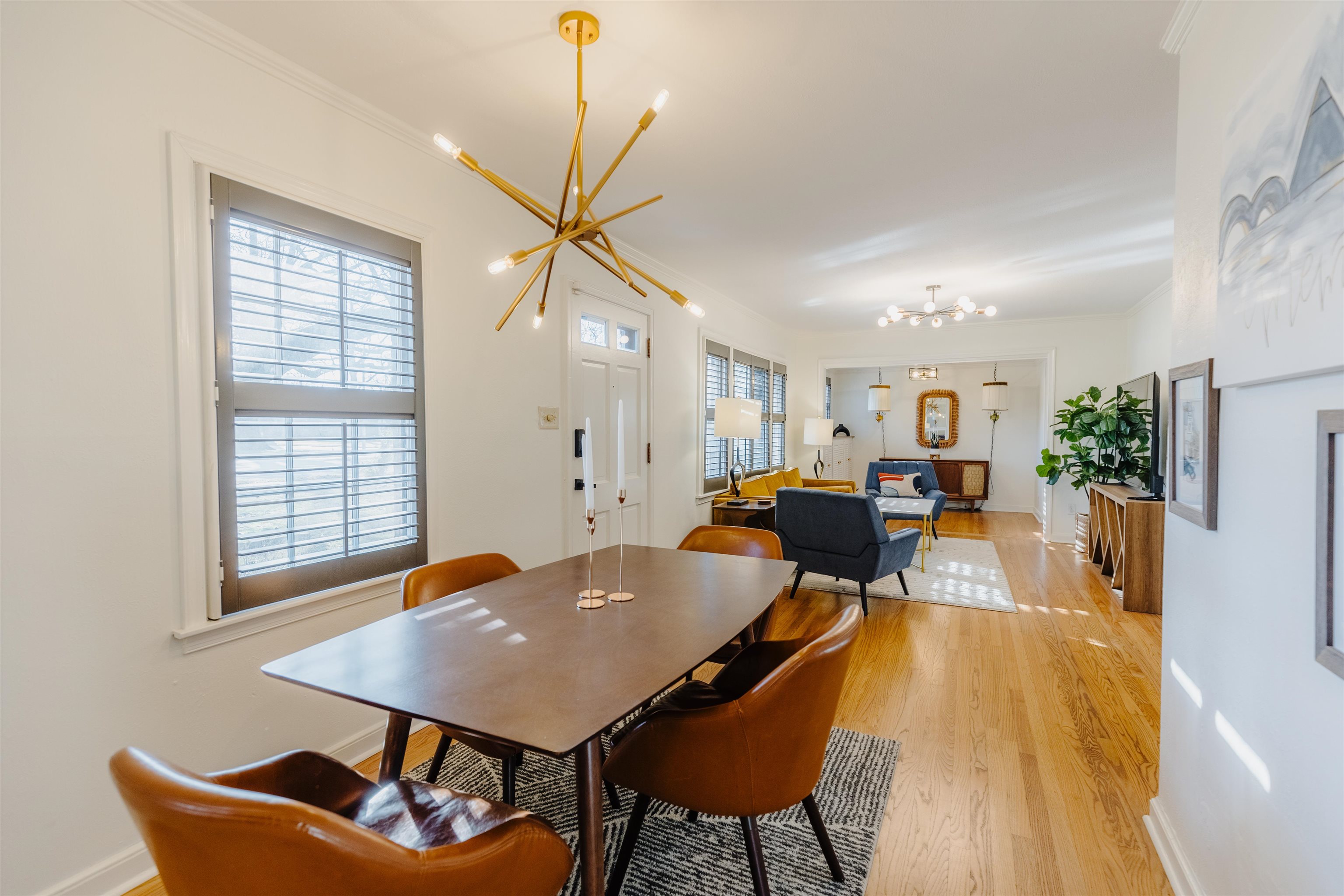1247 Colonial Road Memphis, TN 38117 - Photo 2 of 29 a view of a dining room with furniture and wooden floor