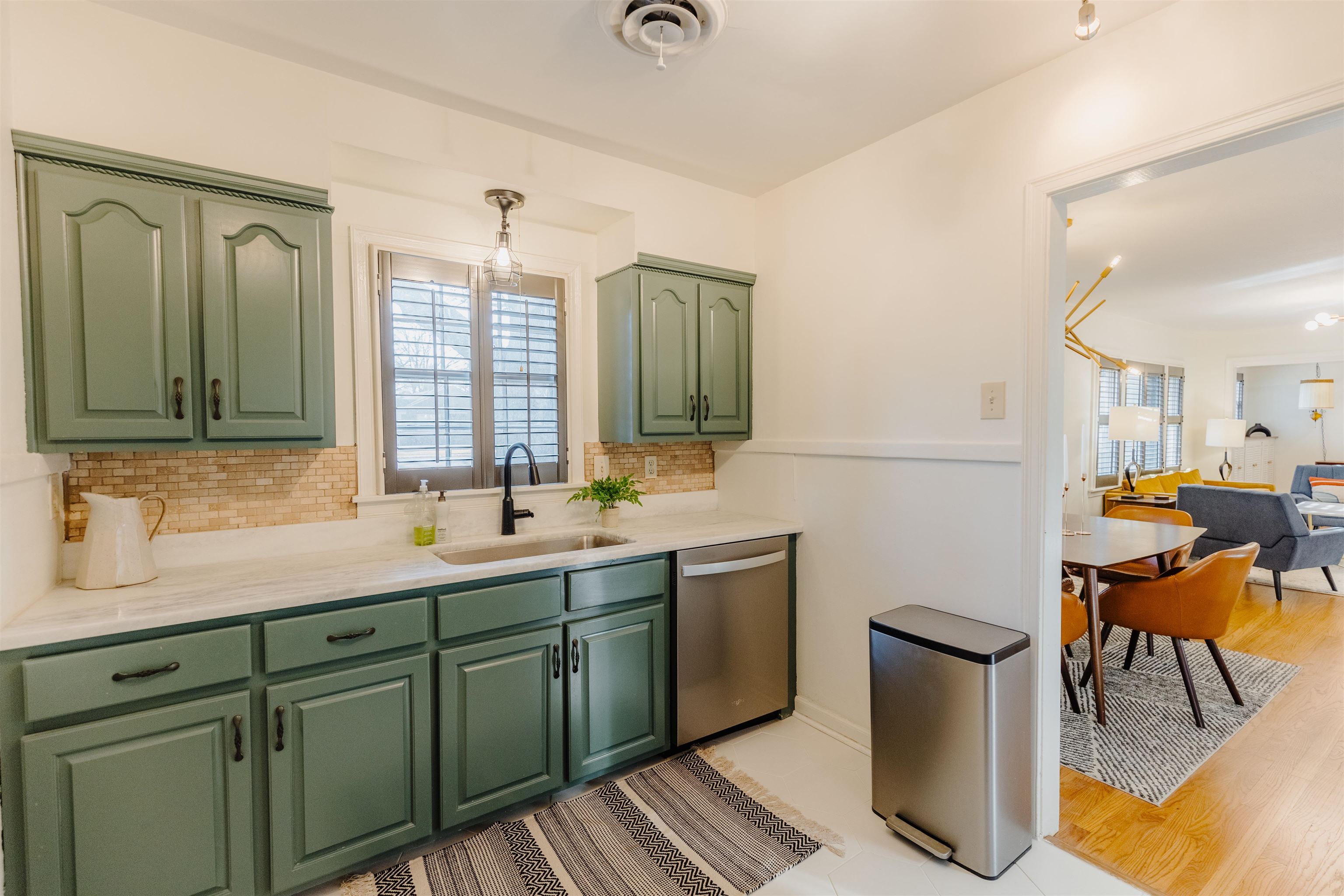 1247 Colonial Road Memphis, TN 38117 - Photo 6 of 29 a bathroom with a sink and a mirror