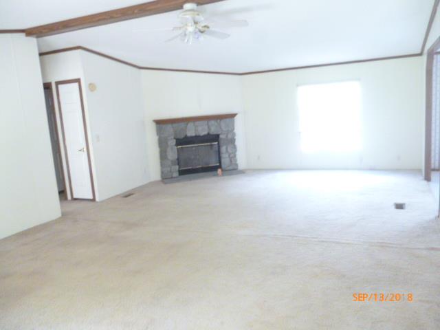 8711 Pinewood Road Lyles, TN 37098 - Photo 8 of 18 Large great room with fireplace