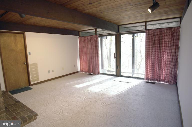 10606 Sweepstakes Road Damascus, MD 20872 - Photo 23 of 30 Recreation room has sliding doors to the outside.