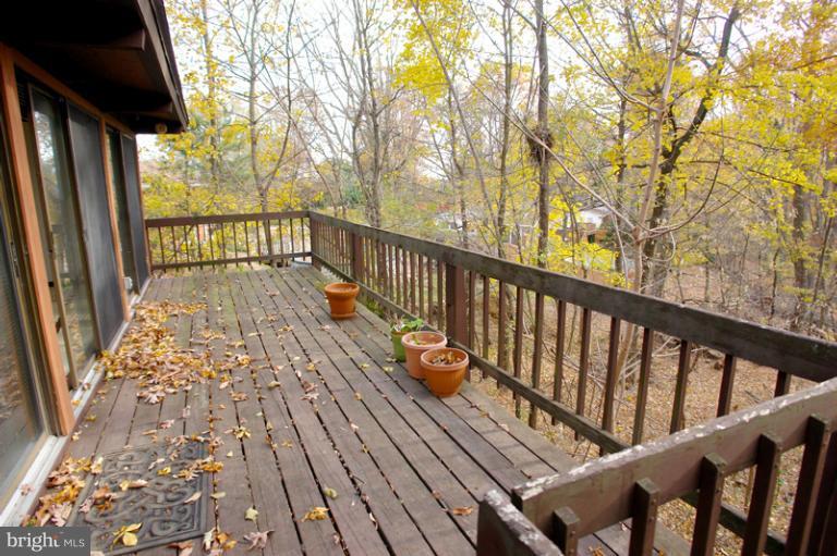 10606 Sweepstakes Road Damascus, MD 20872 - Photo 26 of 30 Deck overlooks wooded backyard.