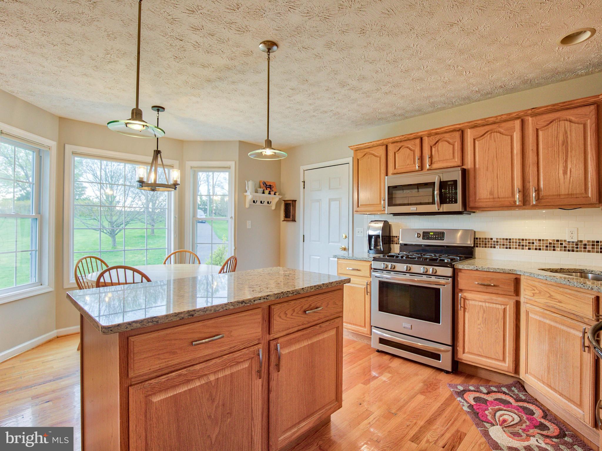 3653 Shepherds Mill Road Berryville, VA 22611 - Photo 20 of 40 Kitchen features wood flooring & granite counters