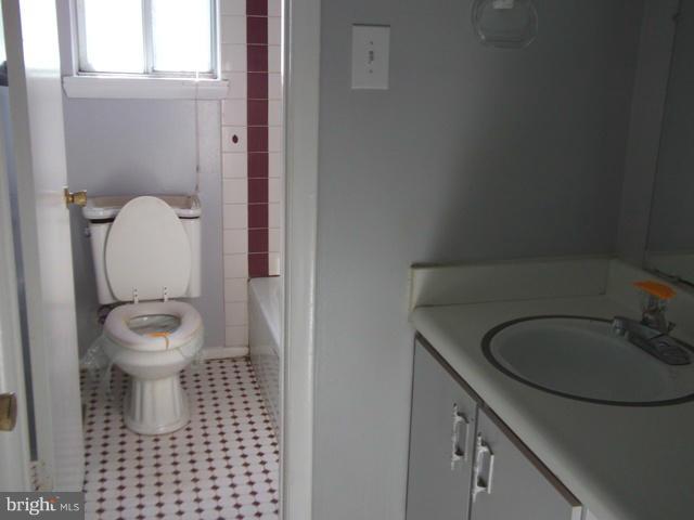 344 Laburnum Road Edgewood, MD 21040 - Photo 11 of 15 a bathroom with a toilet and a sink