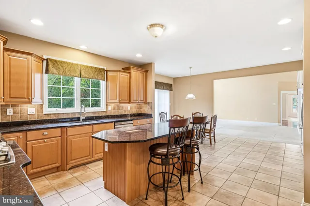 a view of a livingroom with furniture and a fireplace