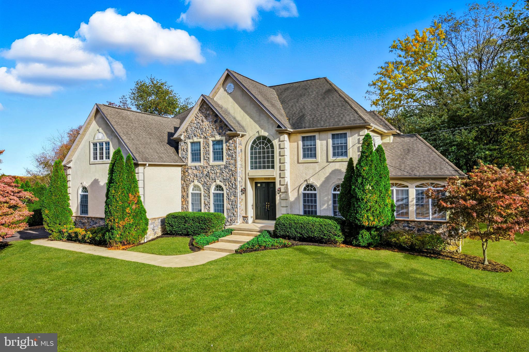950 Borton Landing Road Moorestown, NJ 08057 - Photo 2 of 53 a front view of a house with a yard