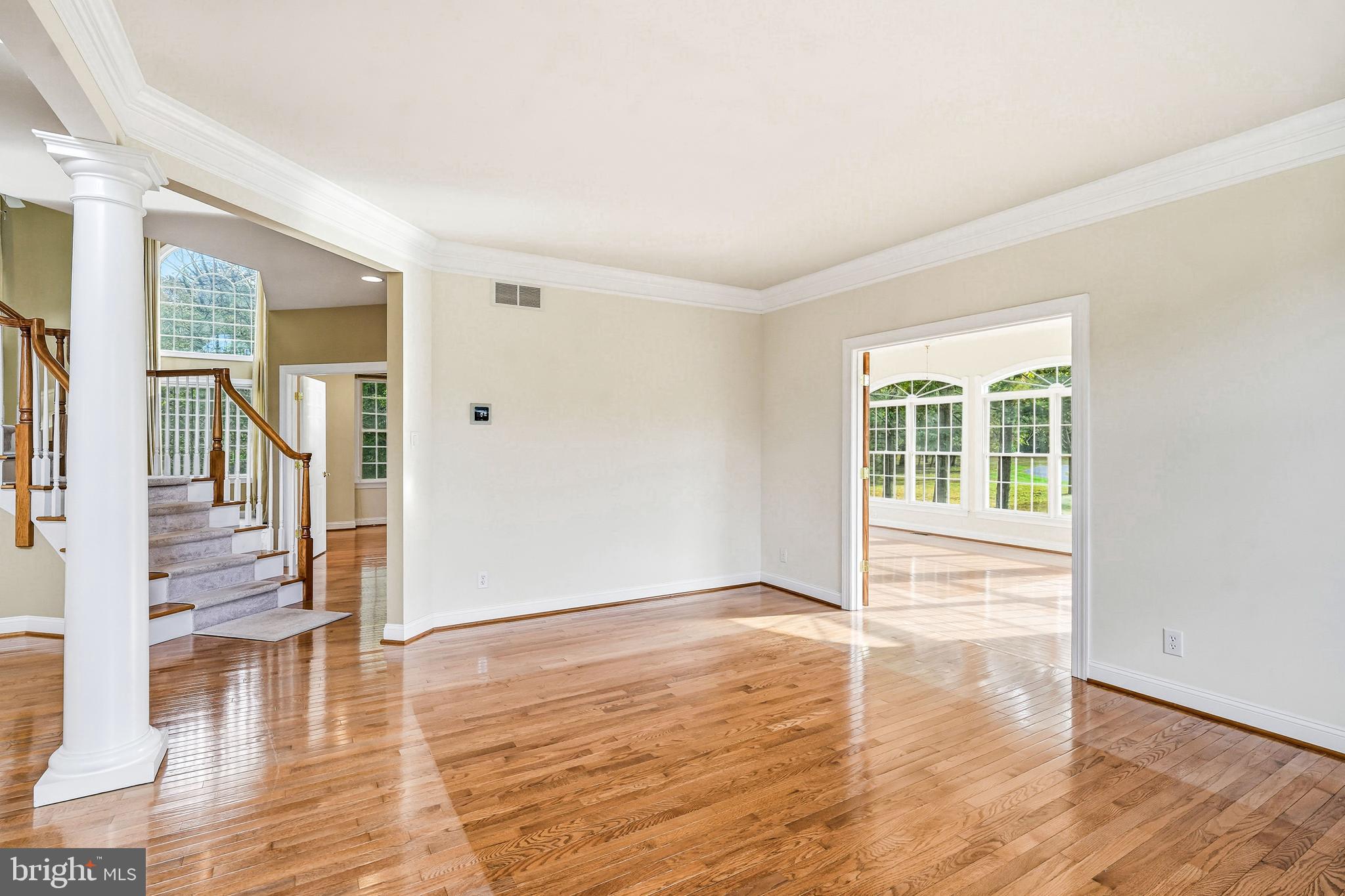 950 Borton Landing Road Moorestown, NJ 08057 - Photo 21 of 53 wooden floor in an empty room with a window