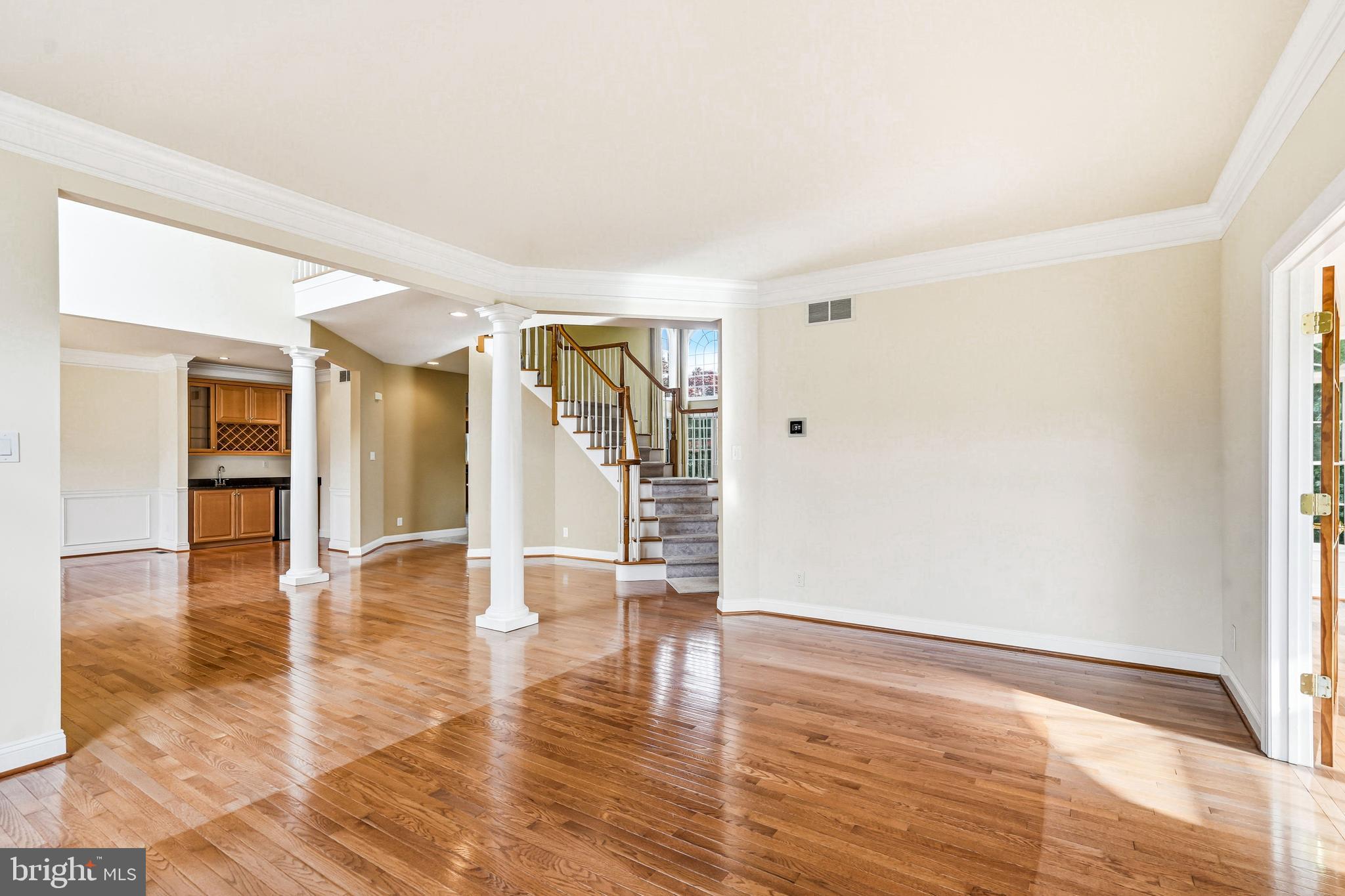 950 Borton Landing Road Moorestown, NJ 08057 - Photo 22 of 53 a view of an empty room with wooden floor and a window