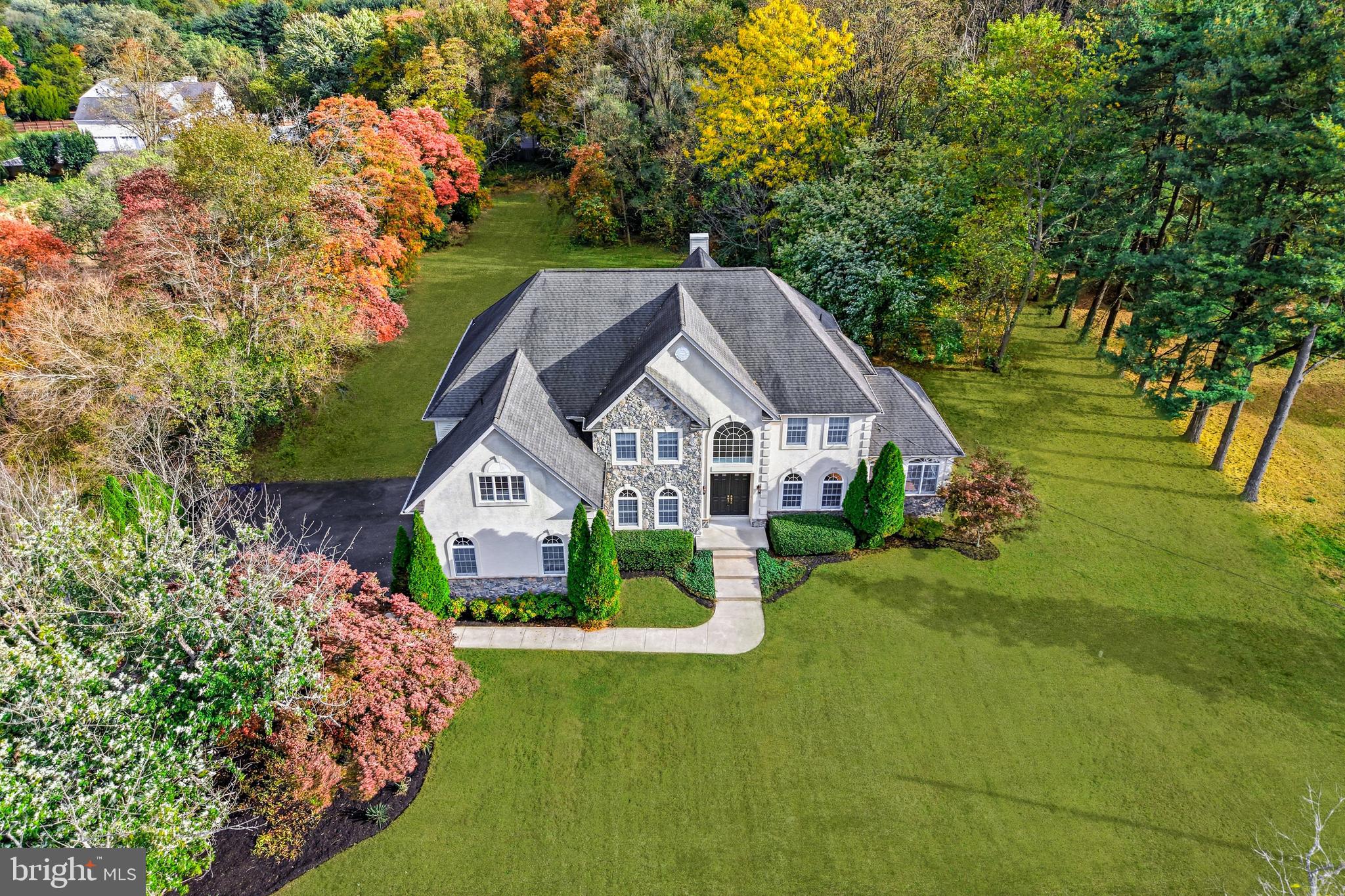 950 Borton Landing Road Moorestown, NJ 08057 - Photo 3 of 53 a aerial view of a house next to a big yard and large trees
