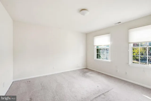 a bathroom with a sink a mirror and a bathtub