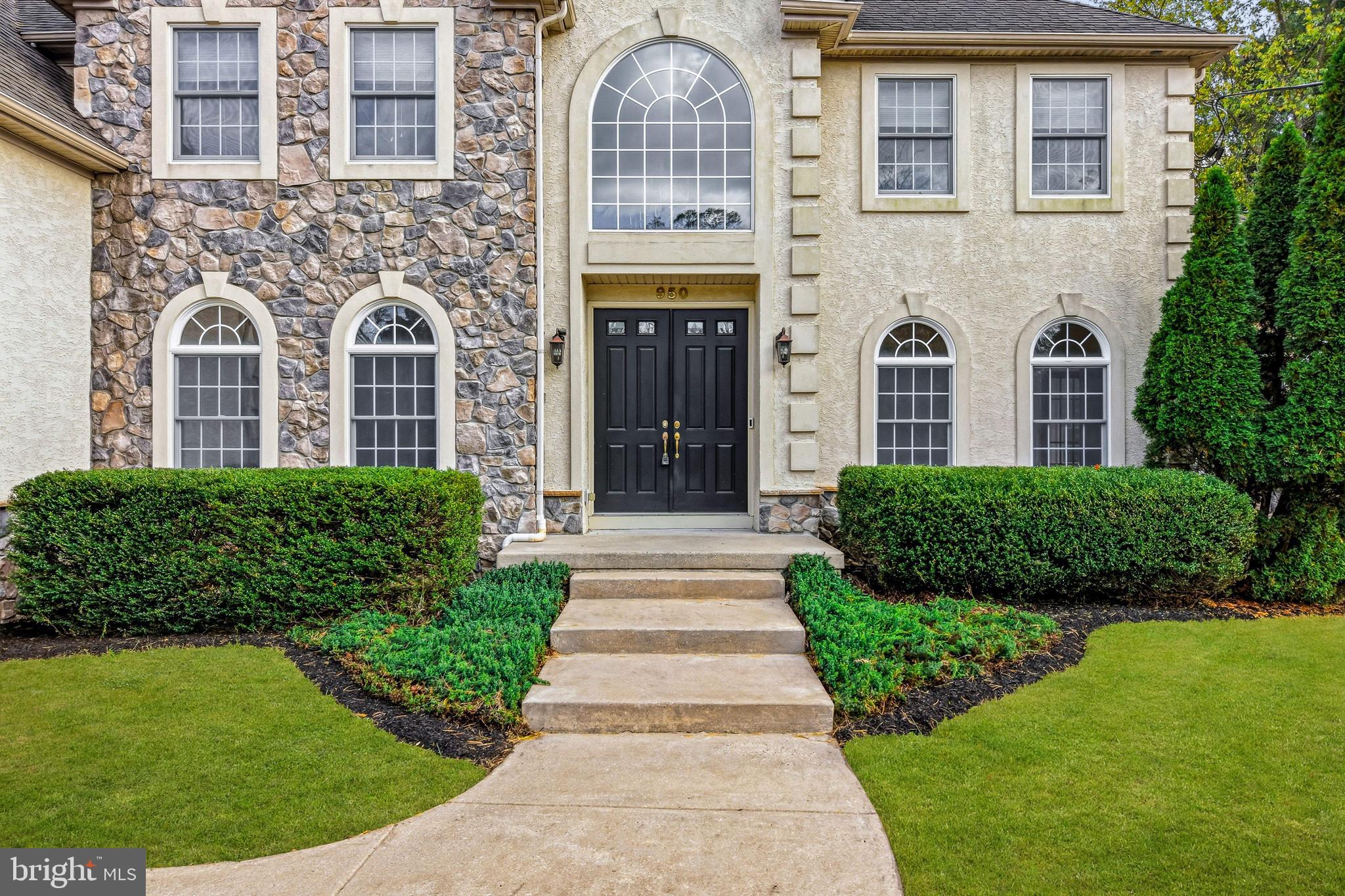 950 Borton Landing Road Moorestown, NJ 08057 - Photo 4 of 53 front view of a brick house with a yard