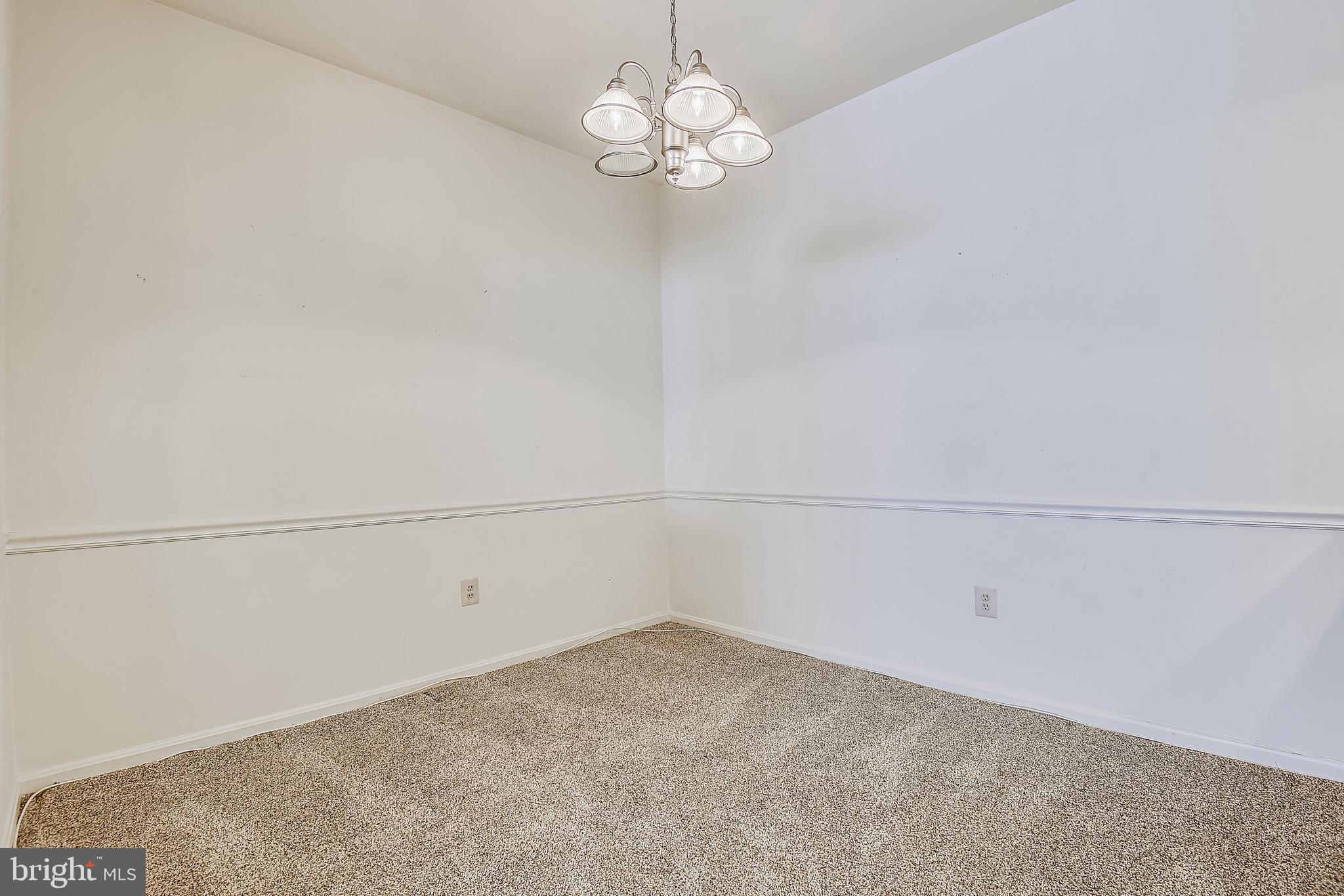 2704 Summerview Way, Unit 103 Annapolis, MD 21401 - Photo 13 of 41 Dining Room with Chair Rail