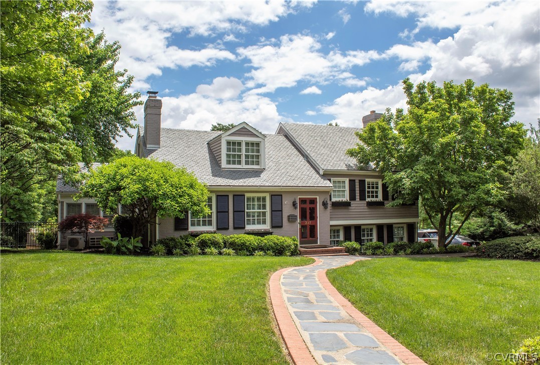 This brick and slate home is tucked away on Gun Cl