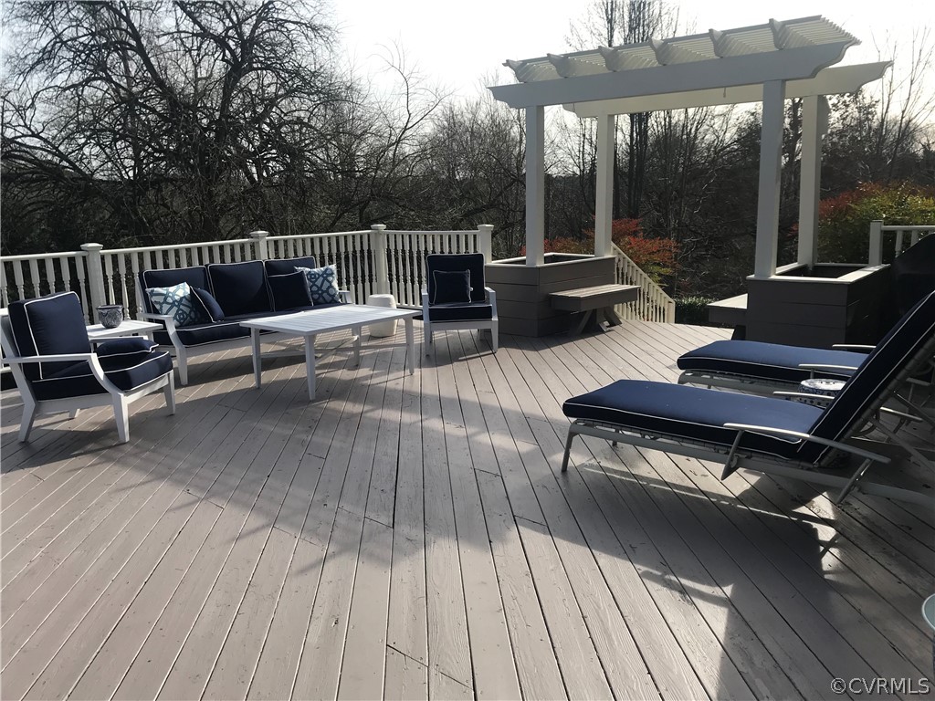227 Gun Club Road Richmond, VA 23221 - Photo 31 of 34 The sunroom opens onto a spacious rear deck with p