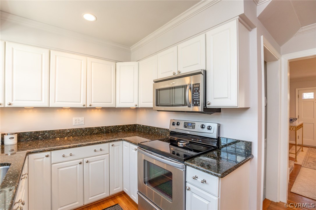 227 Gun Club Road Richmond, VA 23221 - Photo 8 of 34 Appliances also include a Whirlpool electric range