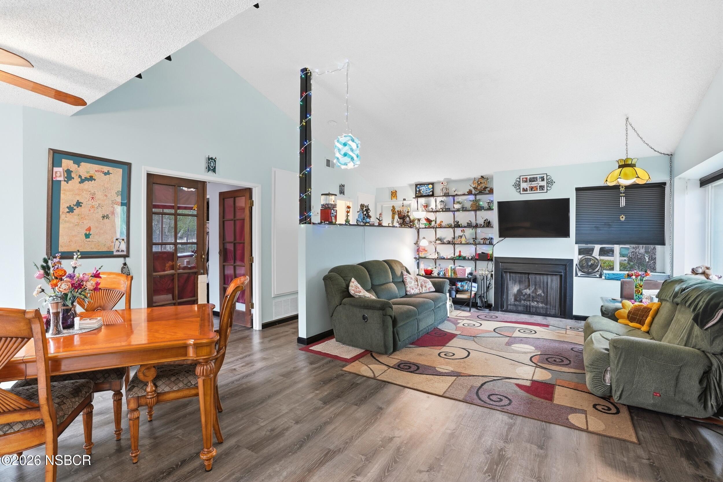 218 North R Street Lompoc, CA 93436 - Photo 6 of 24 a living room with fireplace furniture and decor