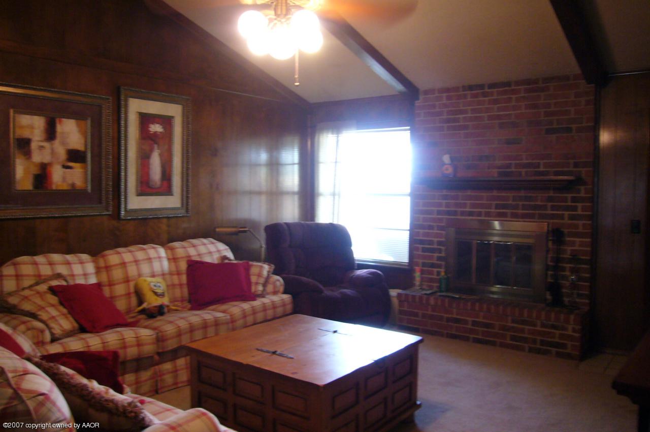 5700 South Milam Street Amarillo, TX 79110 - Photo 7 of 10 Living Room w/fireplace